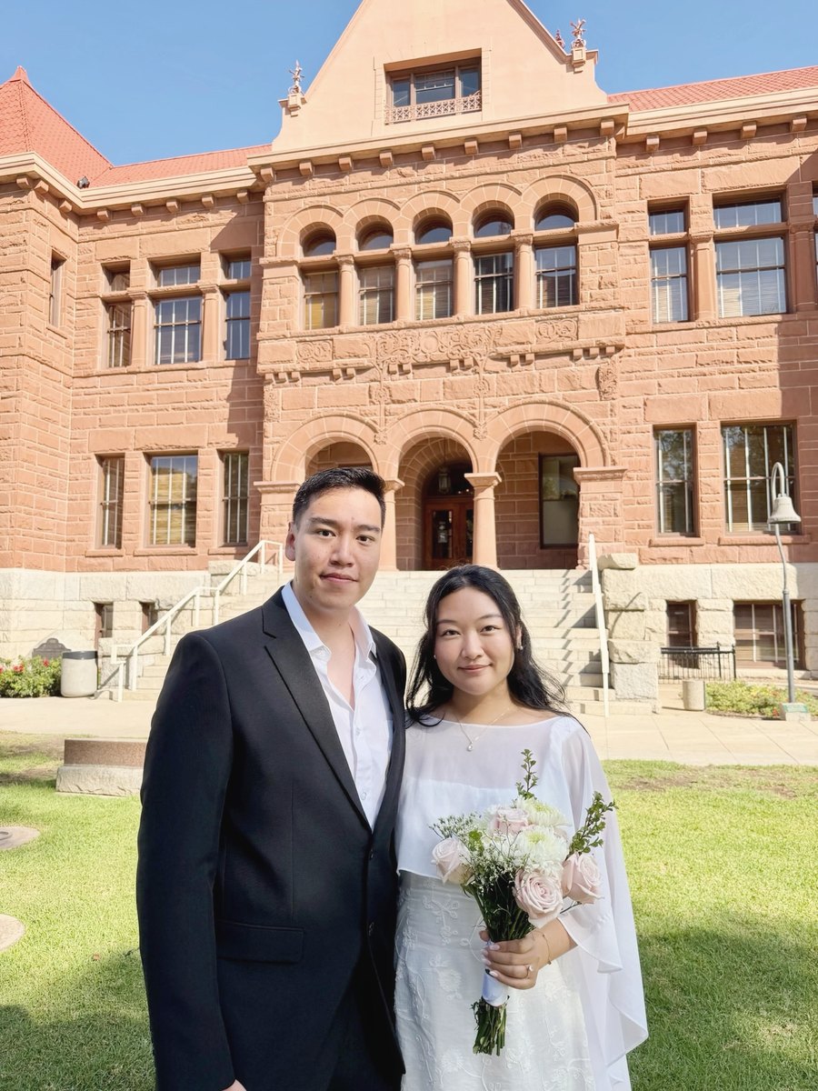 Brendan and Valeria on the lawn in front of the old courthouse